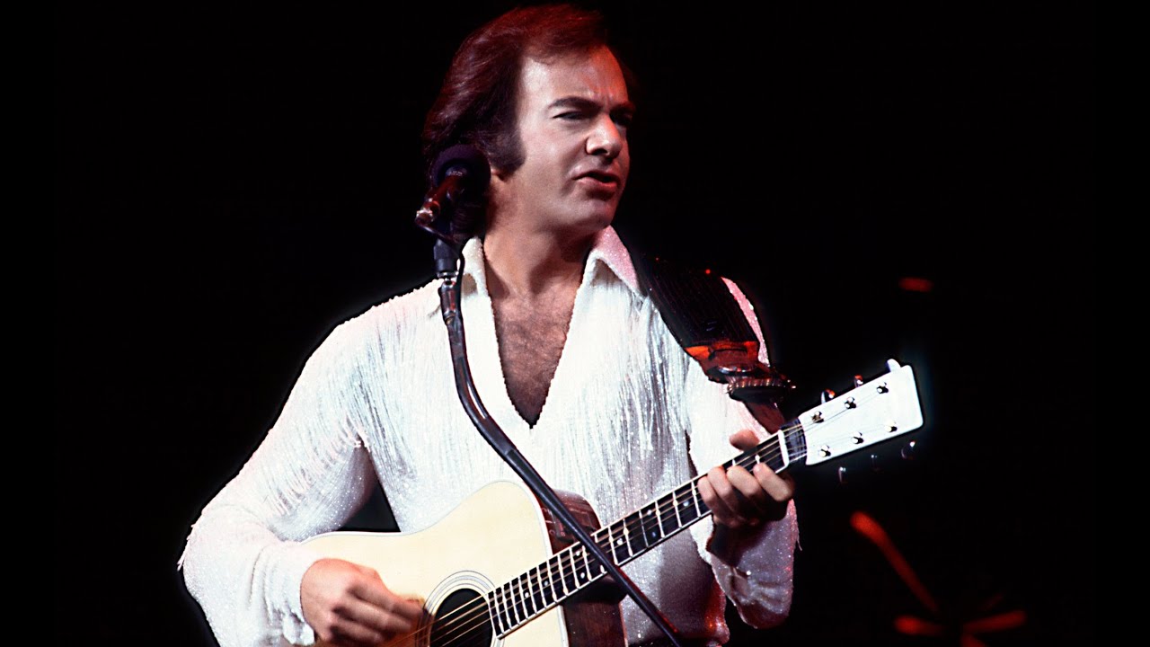 Neil Diamond's "America" as the 1980 The Jazz Singer anthem that grew from soundtrack number into a defining arena-era public song