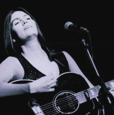 Emmylou Harris - Roses in the Snow, the 1980 title track that proved her mainstream country audience would embrace a traditional acoustic bluegrass sound