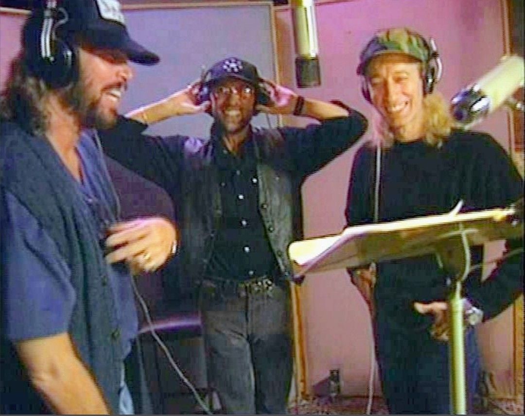 Bee Gees 'Kiss of Life' from the 1993 Size Isn't Everything album, delivering a high-energy pop-rock sound driven by Robin Gibb's lead vocal