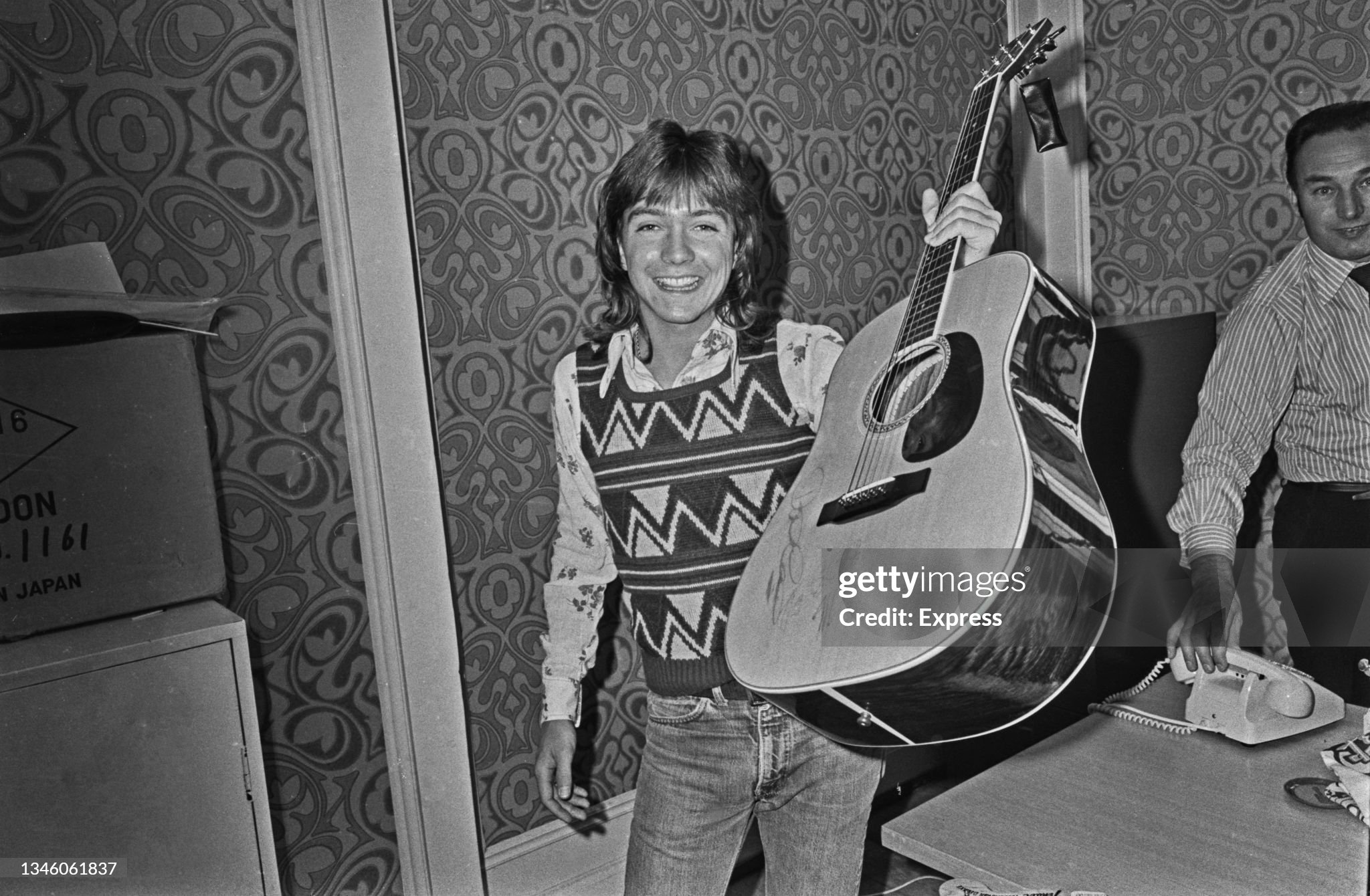 David Cassidy's 1972 solo track "I Am a Clown" from Cherish, featuring Tony Romeo's lyrics about the isolation behind the teen-idol smile