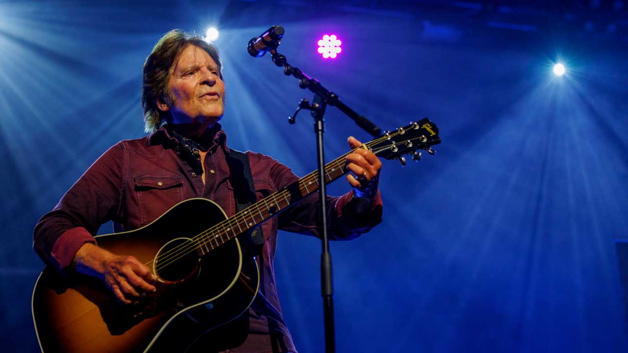 John Fogerty's "Weeping in the Promised Land" in 2021 as a solo gospel-tinged reflection on American unrest