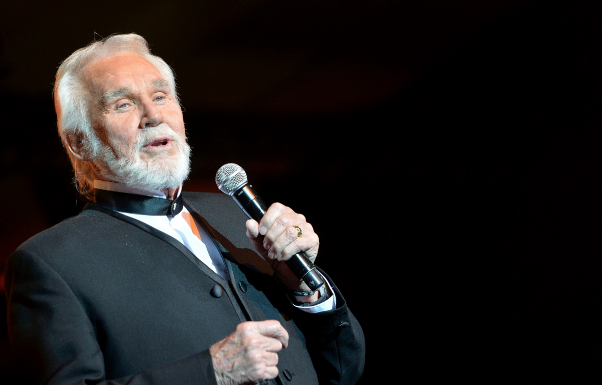 The heartbreak and storytelling that drove Kenny Rogers's 1977 breakthrough single "Lucille," which became his first solo Billboard country number-one hit.