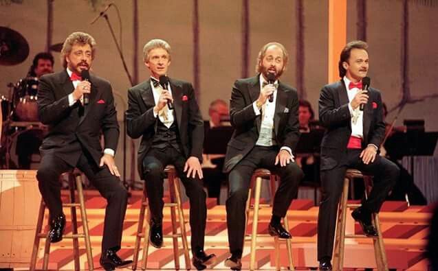 introduced their unique four-part harmony to a mainstream audience with their clever 1965 crossover hit "Flowers on the Wall."